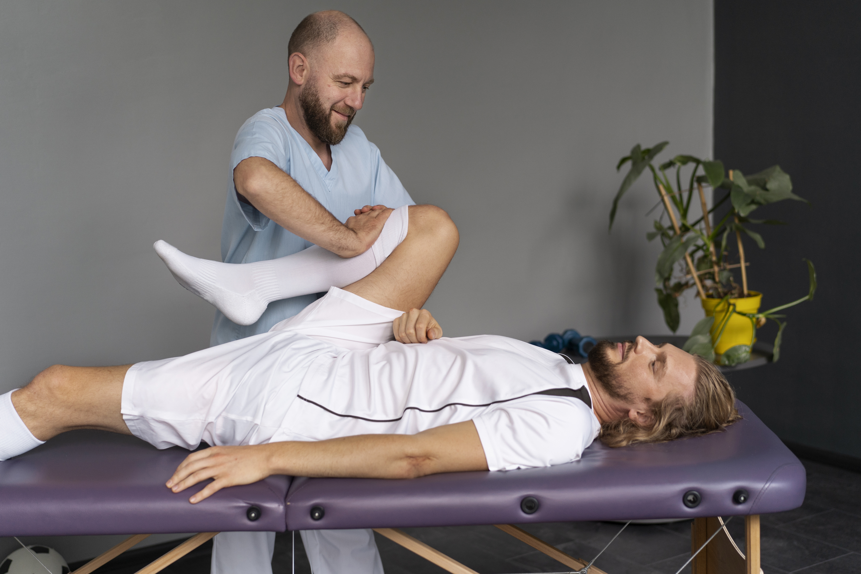full shot physiotherapist helping patient at core concept